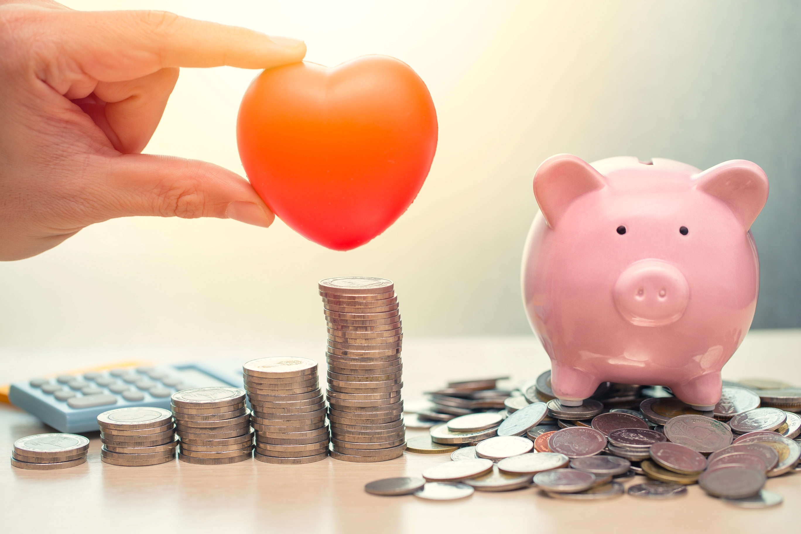 Heart and Saving Money Piggy Bank.