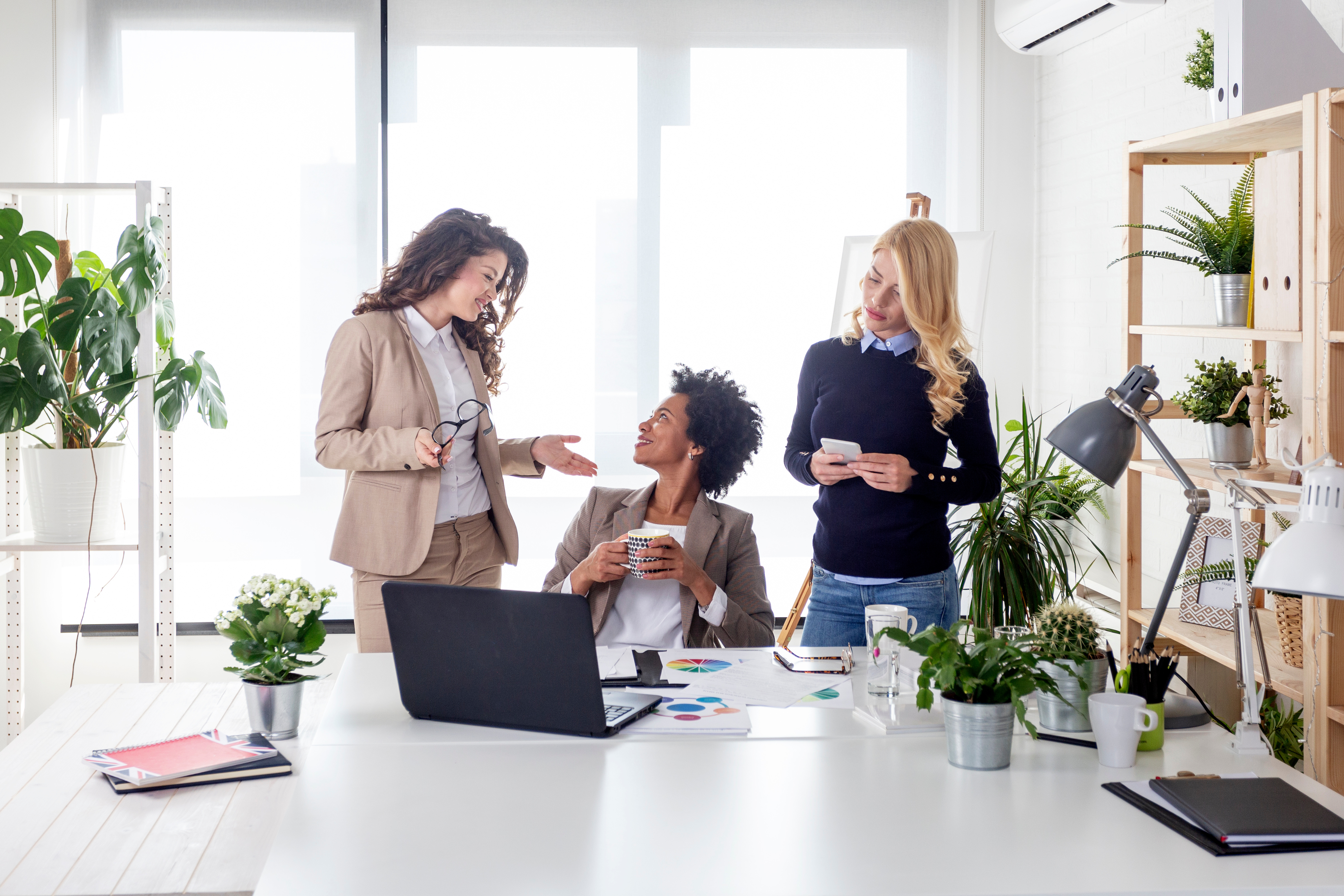 women discussing finances
